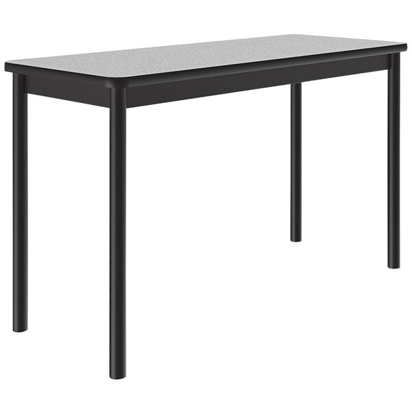 A black rectangular table with a gray granite surface and legs.