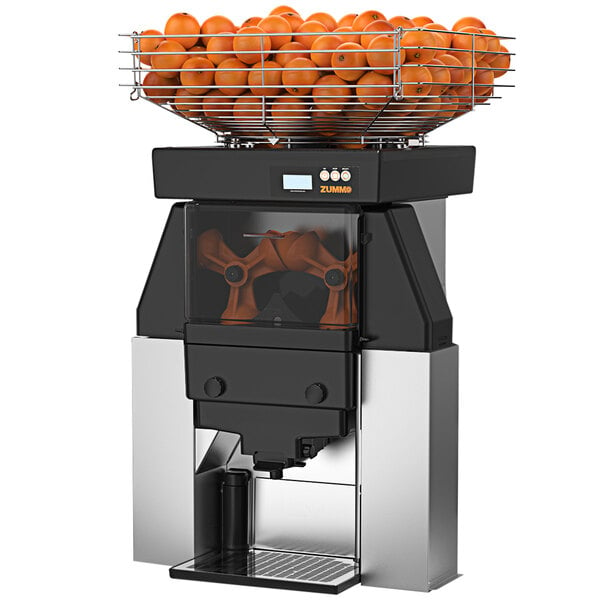 A Zummo commercial juicer with oranges in the top.