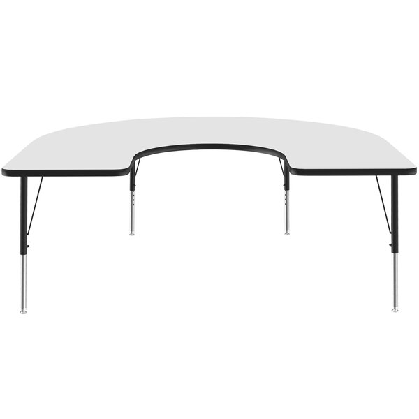 A white table with black trim in a horseshoe shape.