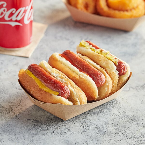 A Nathan's Famous beef slider hot dog with mustard and bread buns.