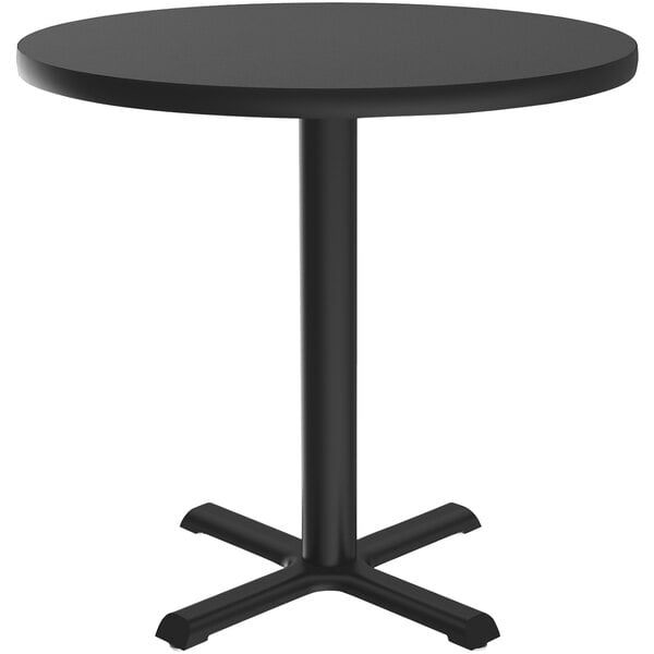 A black round Correll table with a black metal base.