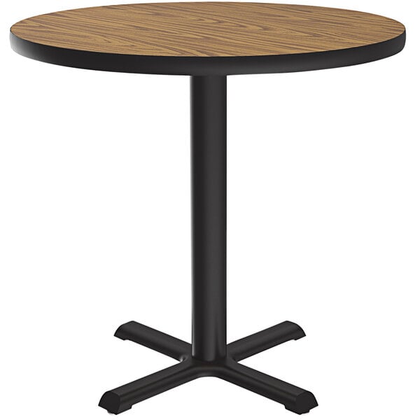 Correll 48″ Round Medium Oak Finish Standard Height Thermal-Fused Laminate Top Cafe / Breakroom Table
