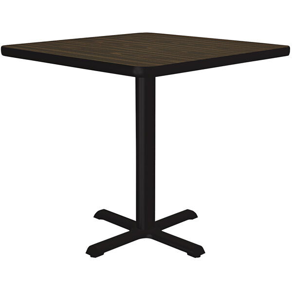 A Correll square table with a black base and walnut finish top.