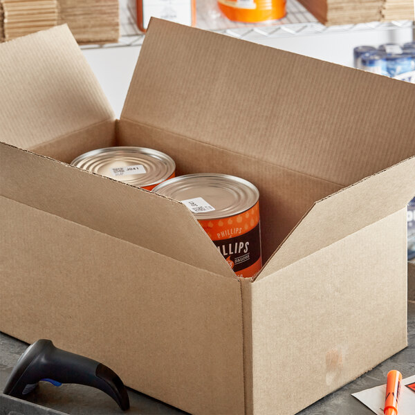 A Lavex cardboard box with cans in it.