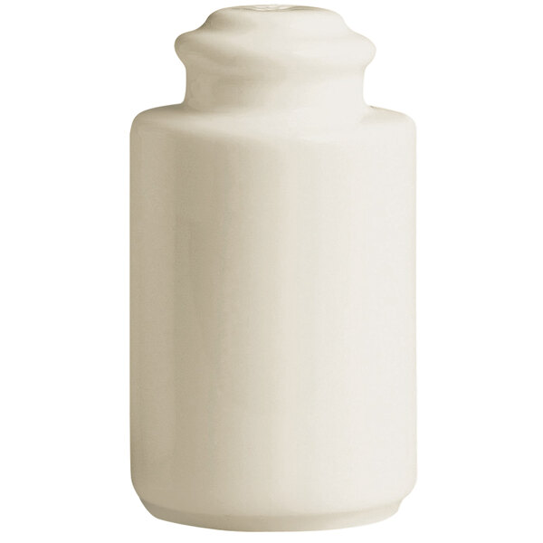 A white RAK Porcelain salt shaker with a lid.