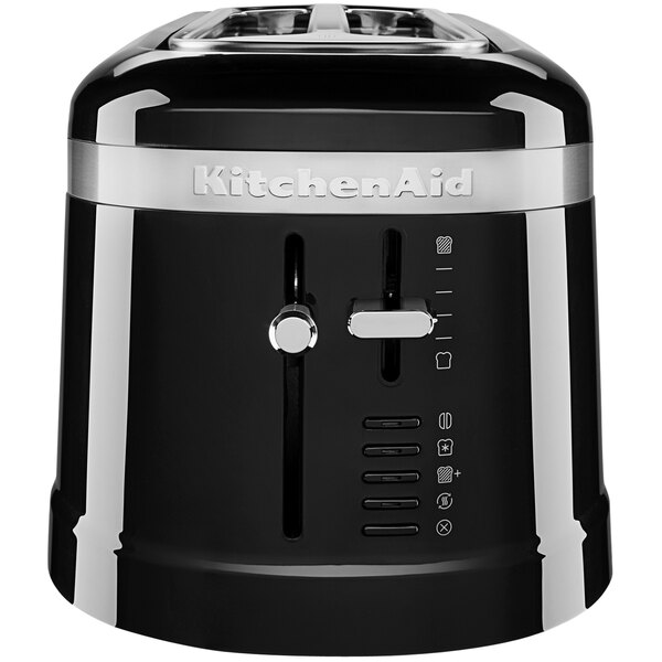 A black and silver KitchenAid toaster with two slices of bread in the slots.