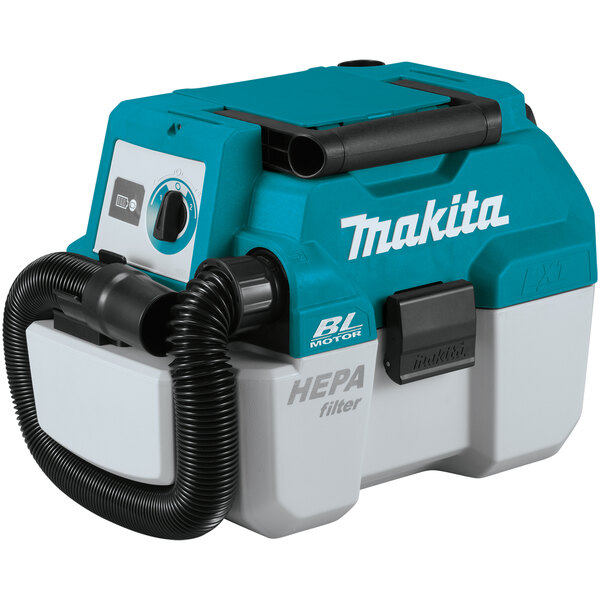 A blue and white Makita wet / dry vacuum with HEPA filtration.