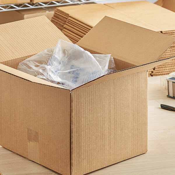 A close-up of a Lavex Kraft cardboard shipping box.