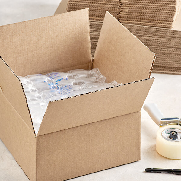 A Lavex cardboard shipping box with plastic bottles inside.
