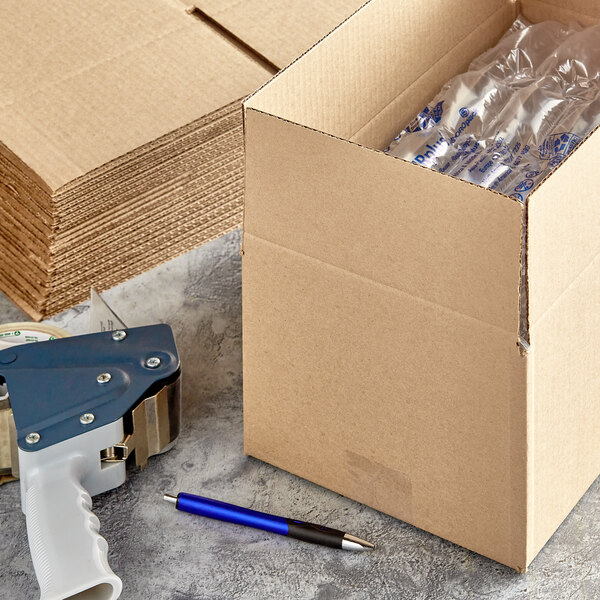 A Lavex cardboard shipping box on a grey surface.
