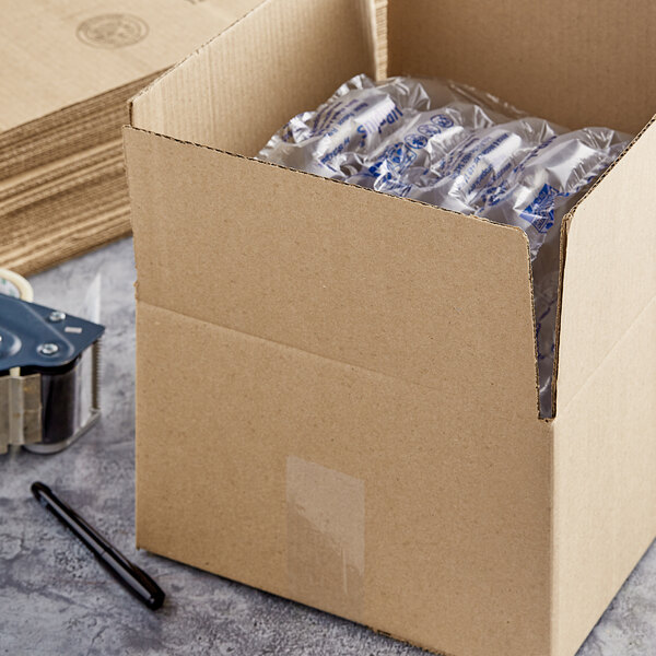 A Lavex cardboard shipping box filled with clear plastic-wrapped packages.