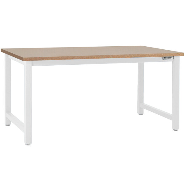A white workbench with a brown particleboard top.