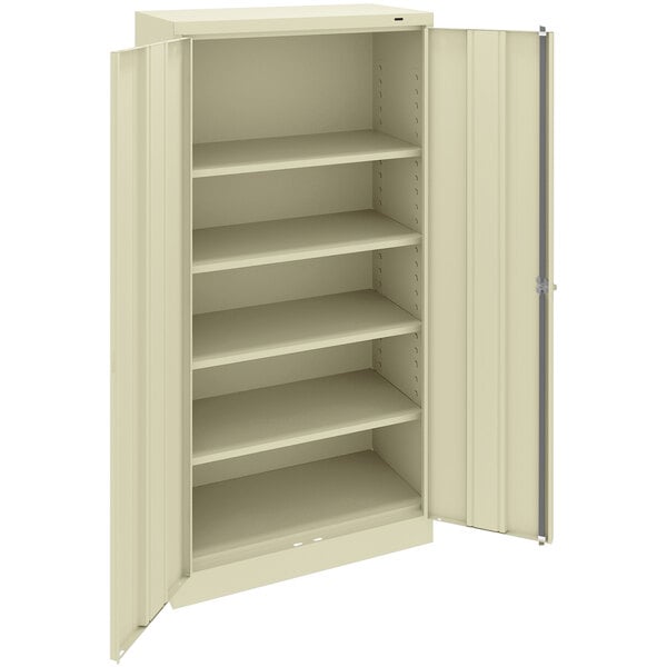 A putty metal storage cabinet with solid doors and shelves.