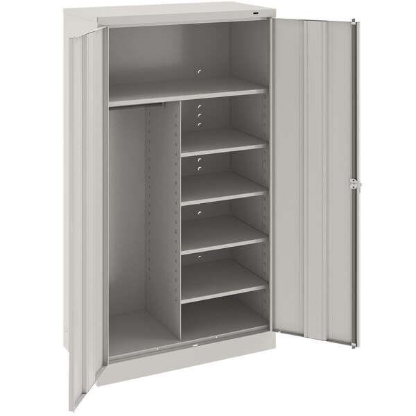 A light gray metal Tennsco combination cabinet with solid doors and shelves.