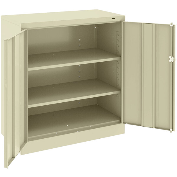 Tennsco 24" x 36" x 42" Putty Standard Storage Cabinet with Solid Doors - Unassembled 1420-CPY