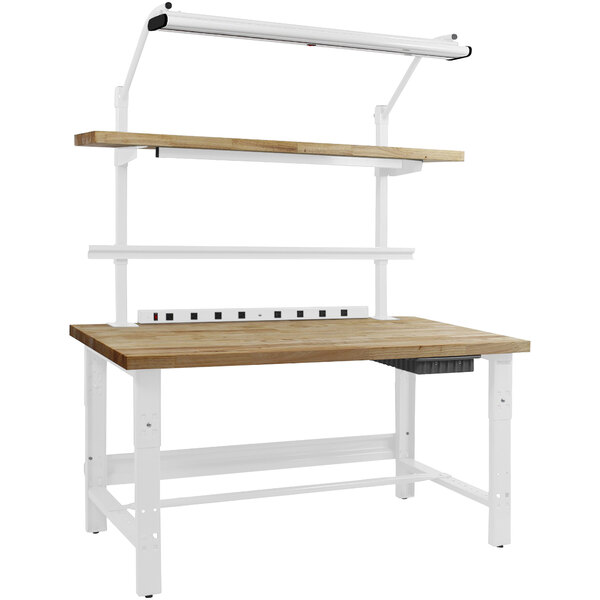 A wood and metal workbench with a white frame and a wooden top.