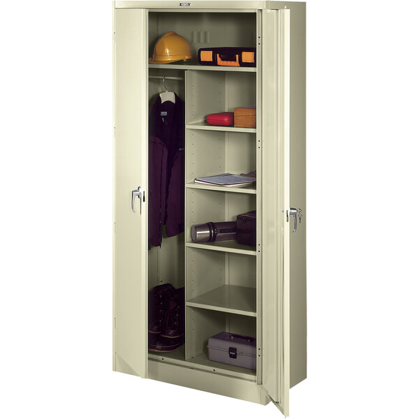 A Tennsco putty metal combination cabinet with solid doors open.