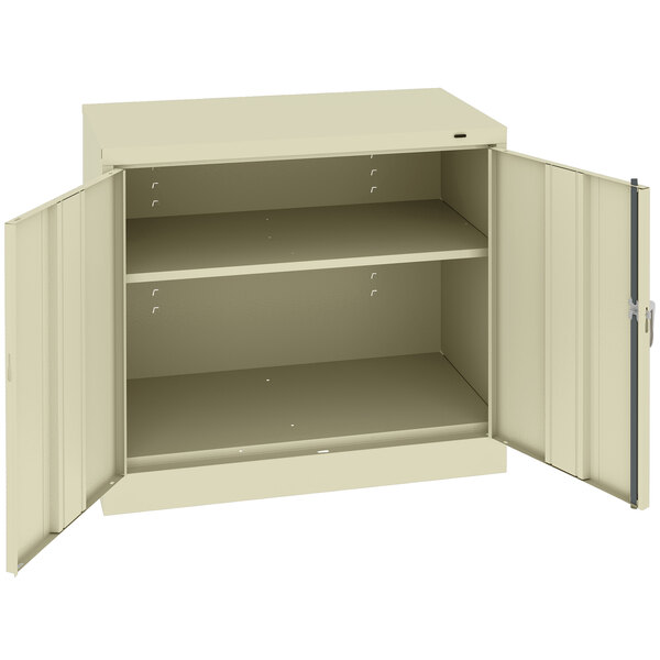 Tennsco 24" x 36" x 36" Putty Standard Storage Cabinet with Solid Doors - Unassembled 2436-CPY
