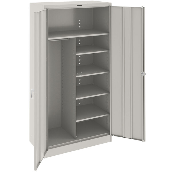 A light gray metal Tennsco combination cabinet with shelves.