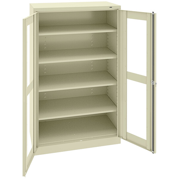 A beige metal cabinet with open C-Thru doors.
