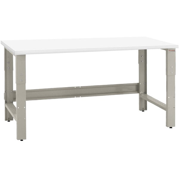 A white rectangular workbench with metal legs.