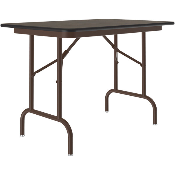 A rectangular black Correll folding table with a metal frame.