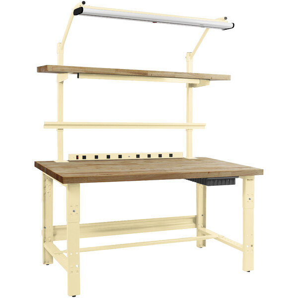 A BenchPro wood and metal workbench with a light above it.