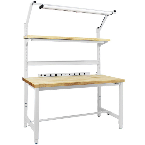 A white and wood work bench with two shelves.