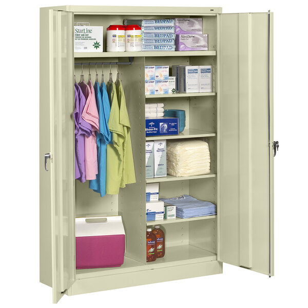 A Tennsco putty jumbo combination cabinet with solid doors on shelves.