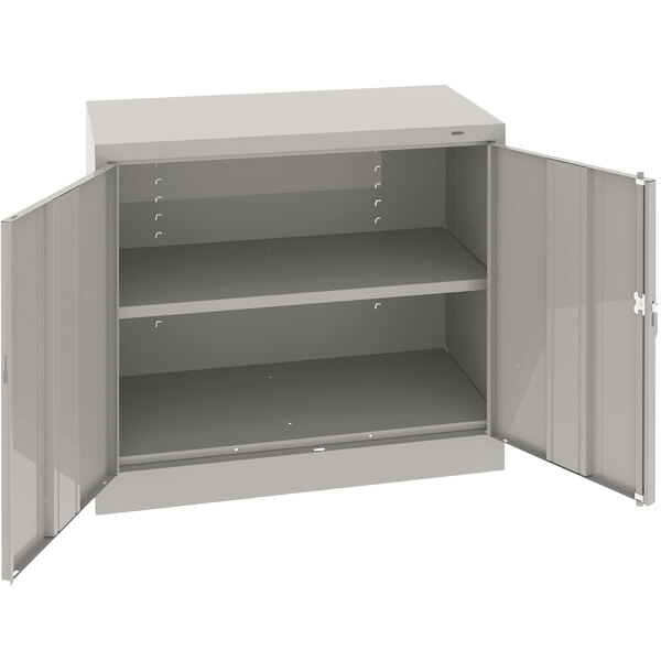 Tennsco 18" x 36" x 36" Light Gray Standard Storage Cabinet with Solid Doors - Unassembled 1436-LGY