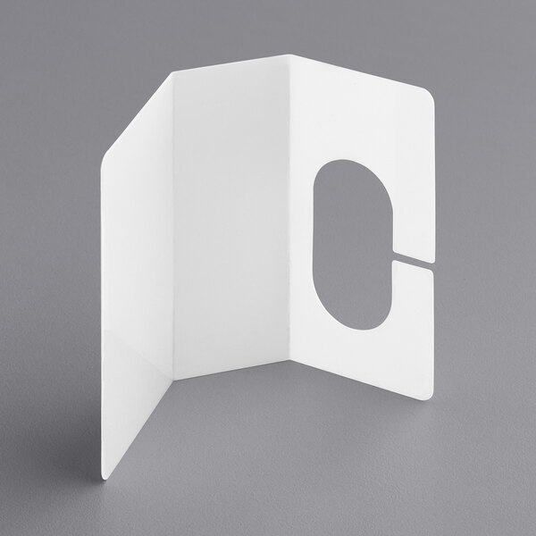 A white rectangular card with a hole in the middle.