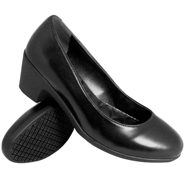 A pair of black Genuine Grip dress shoes for women.