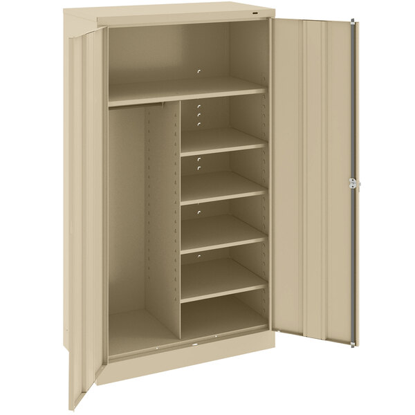 A tan metal Tennsco storage cabinet with shelves and solid doors.