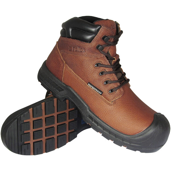 A pair of brown Genuine Grip Vulcan work boots with black soles.