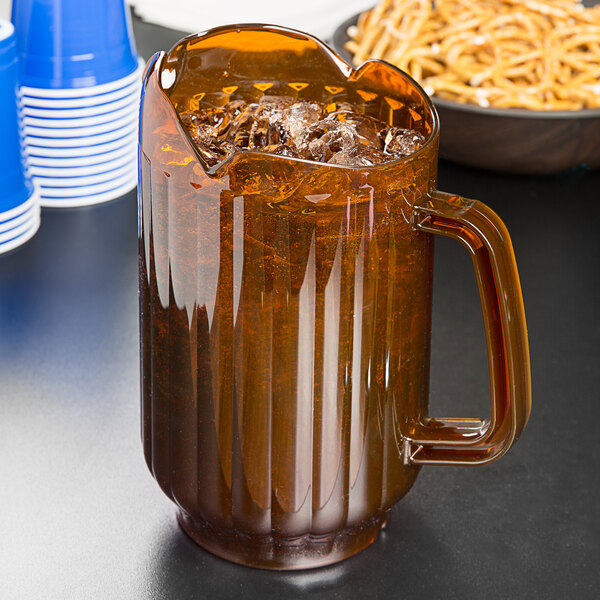 Choice 60 oz. Amber SAN Plastic Beverage Pitcher with 3 Spouts