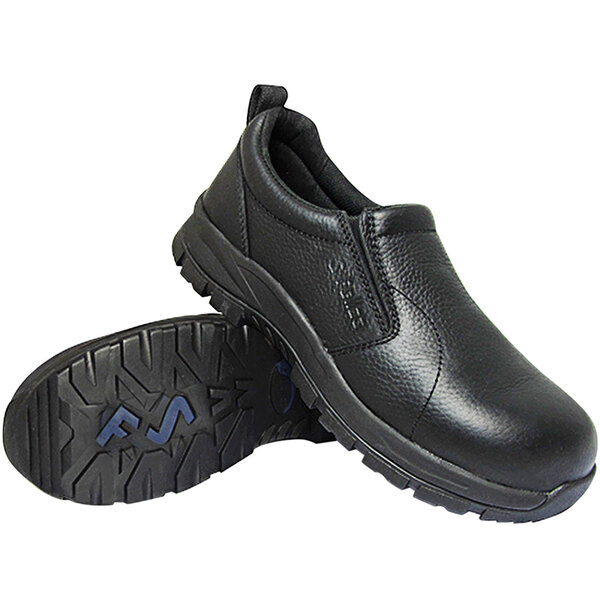 A pair of Genuine Grip black slip-on shoes with a close-up of the sole.