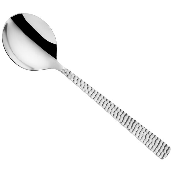 An Amefa Felicity stainless steel soup spoon with a textured handle.