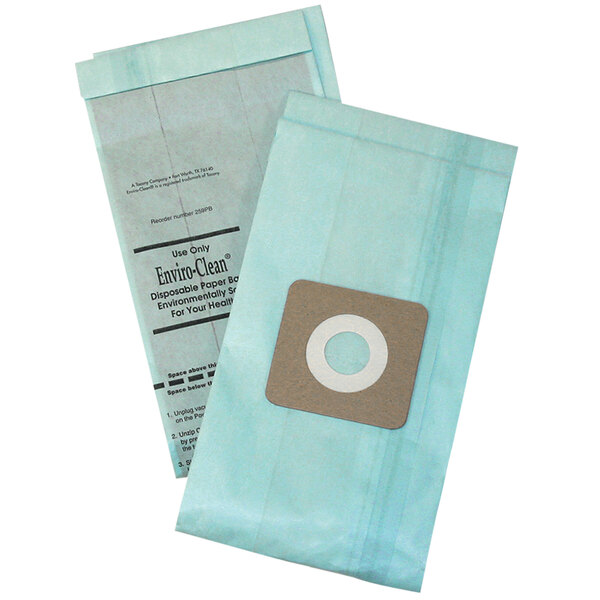 A close-up of two Powr-Flite paper collection bags with white circles.