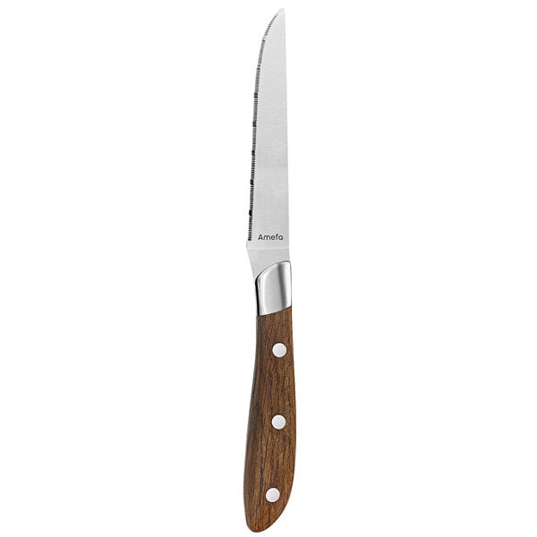 An Amefa Achille steak knife with an Ashwood handle.