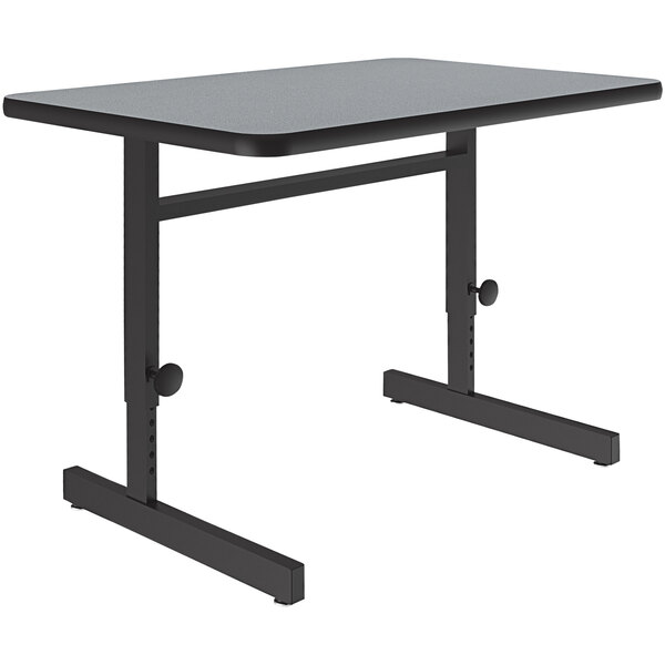 A grey rectangular Correll computer and training desk with an adjustable metal base.
