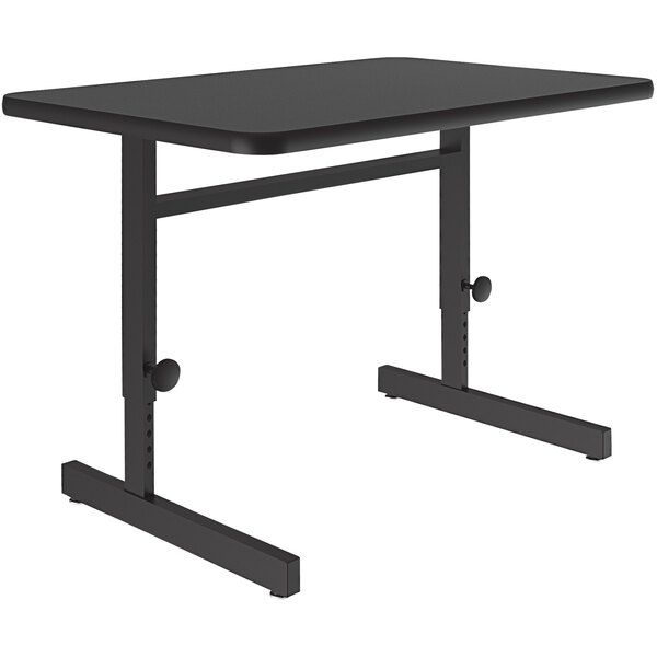 A Correll rectangular black granite finish computer and training desk with adjustable height.