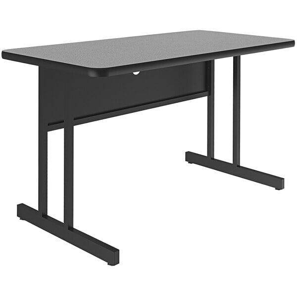 A gray rectangular Correll desk with black legs.