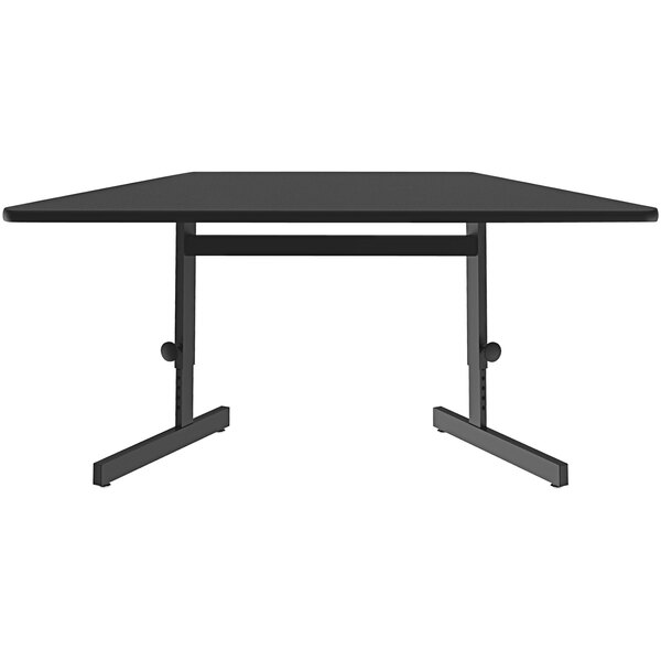 A black trapezoid table with two legs on it.