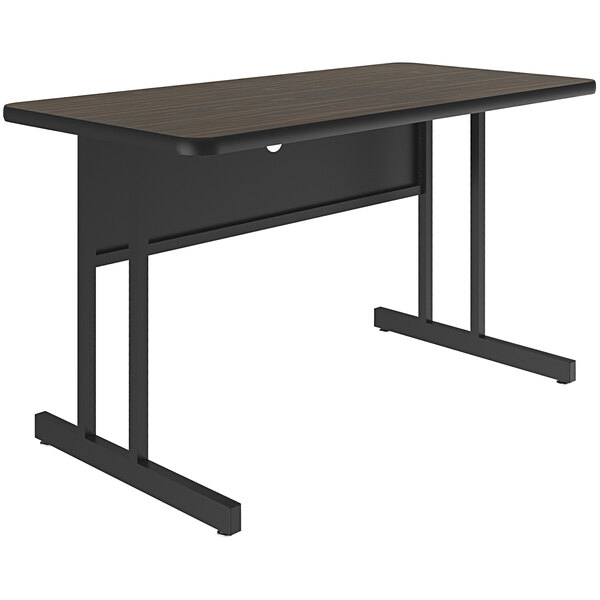 A black and brown Correll desk with a black frame.