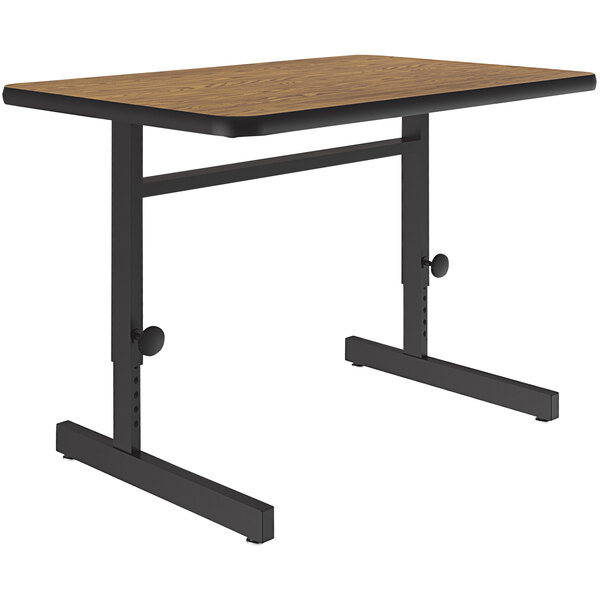 Correll 24″ x 36″ Rectangular Medium Oak Finish 21″ – 29″ Adjustable Height Thermal-Fused Laminate Top Computer and Training Desk