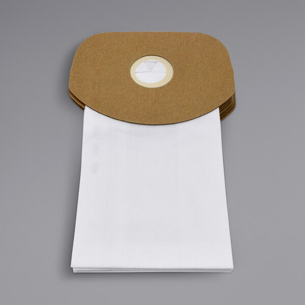 A brown paper bag with a white label and white circle with white text.