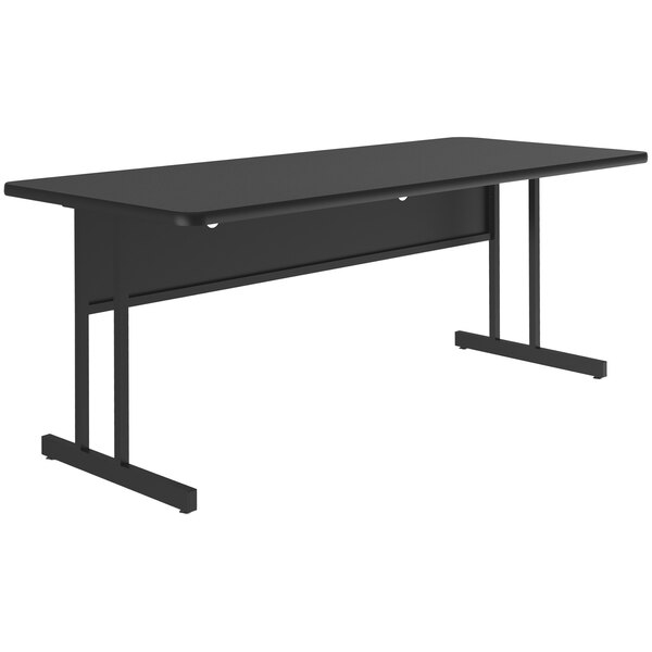 A black rectangular Correll desk with black legs and a granite finish top.