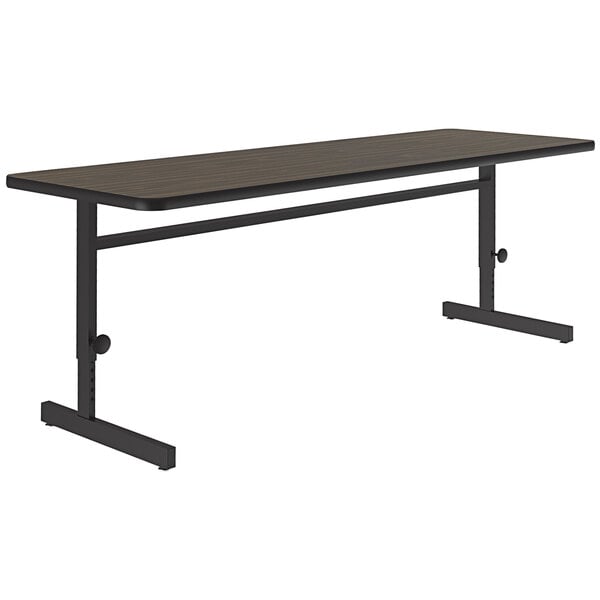 Correll 24″ x 72″ Rectangular Walnut Finish 21″ – 29″ Adjustable Height Thermal-Fused Laminate Top Computer and Training Desk