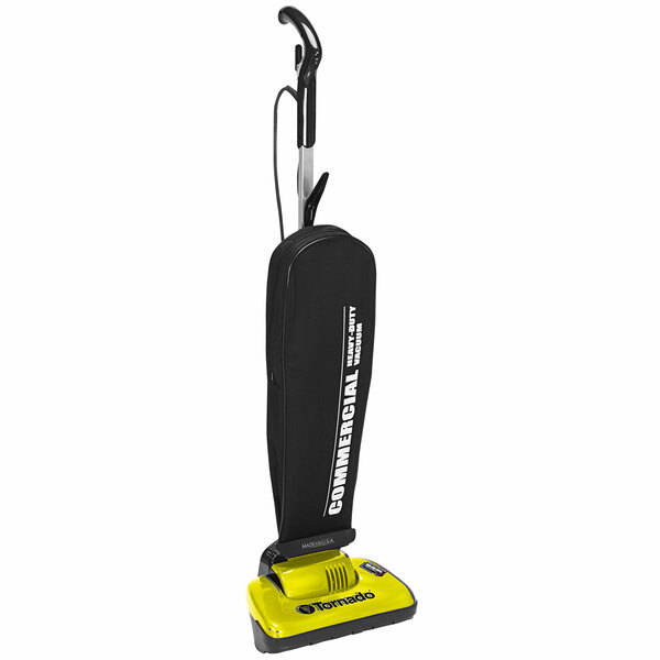 A yellow and black Tornado upright vacuum cleaner with a black bag and white text.