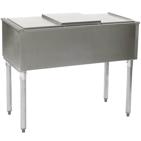 An Eagle Group stainless steel pass-through ice chest on a counter.